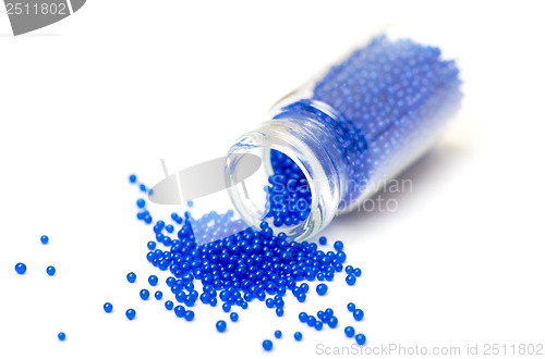 Image of Small Glass Jar filled with Blue Balls of Bead