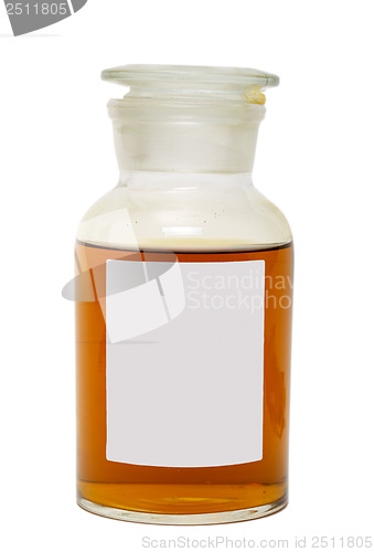 Image of Large Glass Jar with a Lid, Filled with Dark Yellow Honey