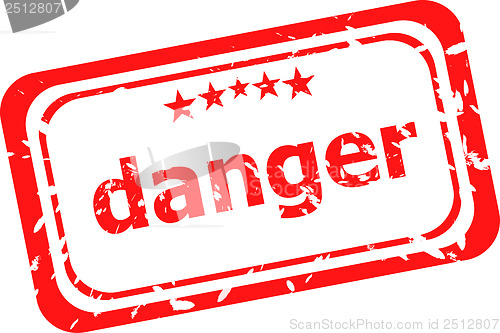 Image of danger word on red rubber old business stamp