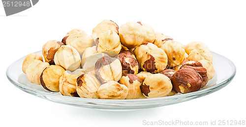 Image of A pile of shell-less hazelnuts, isolated on white background