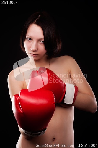 Image of beautiful nude girl with boxing gloves