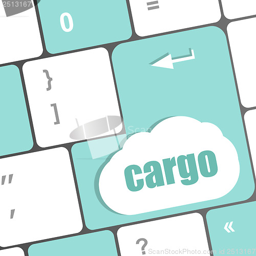 Image of cargo word on laptop computer keyboard key