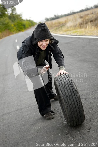 Image of Man With Wheel