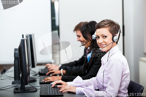 Image of smiling callcenter agent with headset support