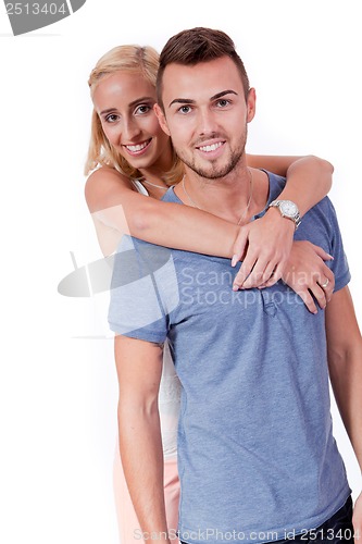 Image of young attractive couple in love embracing portrait