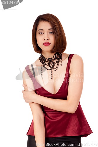 Image of young attractive asian woman with red lips and jewelry isolated