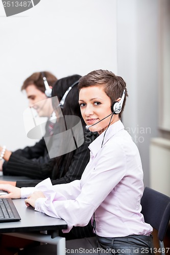 Image of smiling callcenter agent with headset support