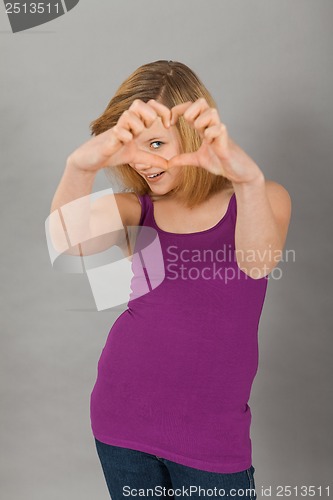Image of young teenager girl smiling having fun