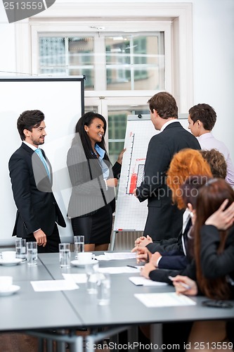 Image of business team in office meeting presentation conference