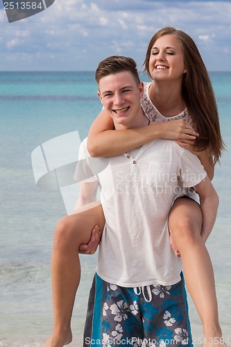 Image of smiling young couple having fun in summer holiday