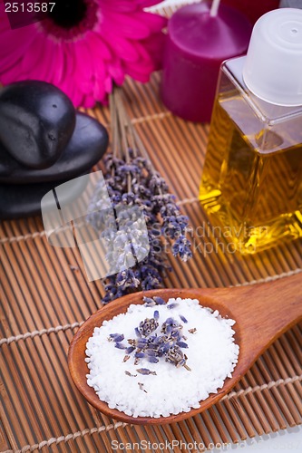 Image of lavender massage oil and bath salt aroma therapy wellness