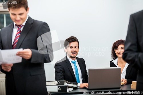 Image of business people working in office teamwork 