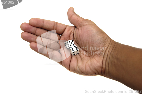 Image of Pair of dice in a hand