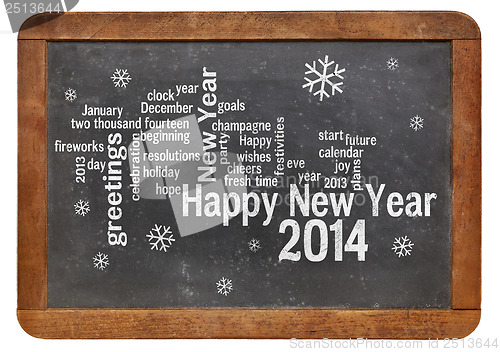 Image of Happy New Year 2014 on blackboard