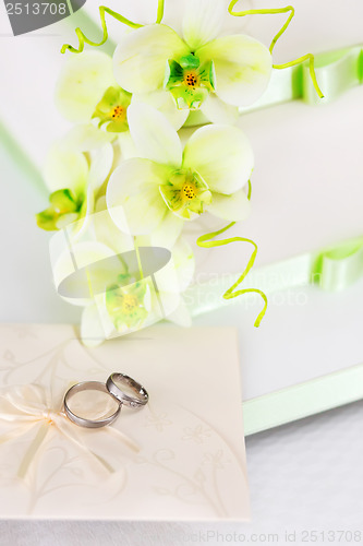 Image of Wedding cake detail with orchid flowers