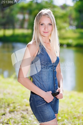 Image of Blonde in jeans clothes