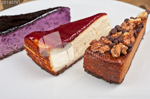 Image of cheesecake with chocolate and nuts