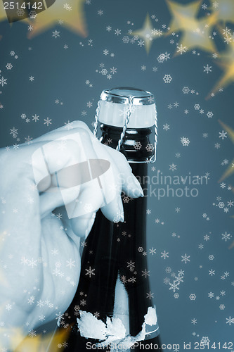 Image of Opening champagne bottle