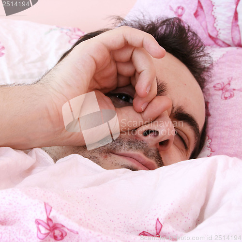 Image of Young man sleeping .