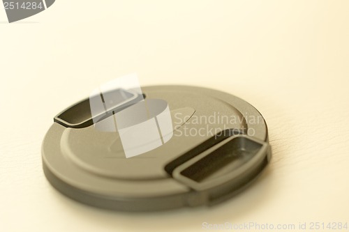 Image of Lens cap isolated on a white background blurred.