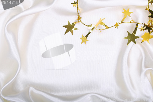 Image of Golden stars and spangles on white silk