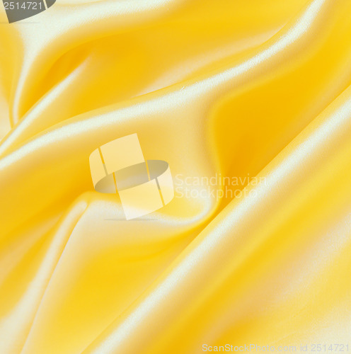 Image of Smooth elegant golden silk as background