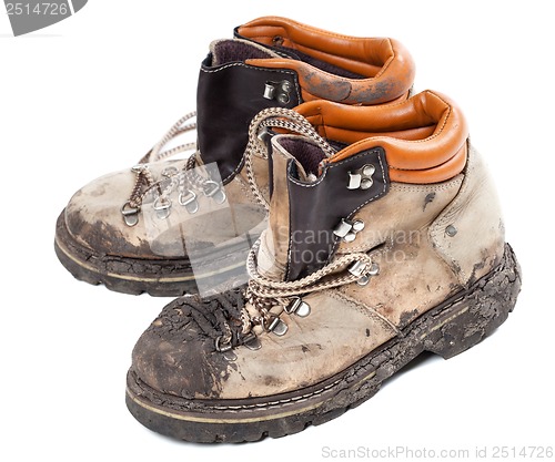 Image of Old dirty hiking boots