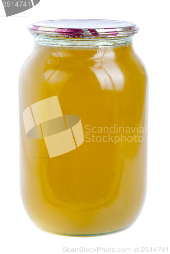 Image of honey in glass jar isolated 