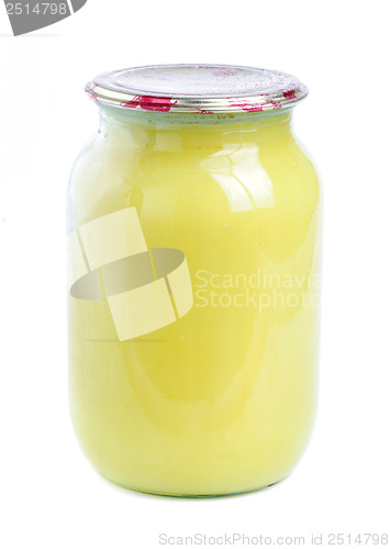 Image of honey in glass jar isolated  