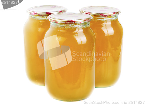 Image of honey in glass jar isolated 