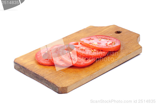 Image of sliced fresh red tomatoes isolated on white background 