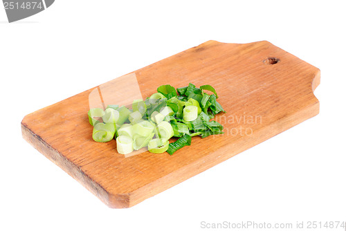 Image of fresh sliced onions on cutting board isolated on white 