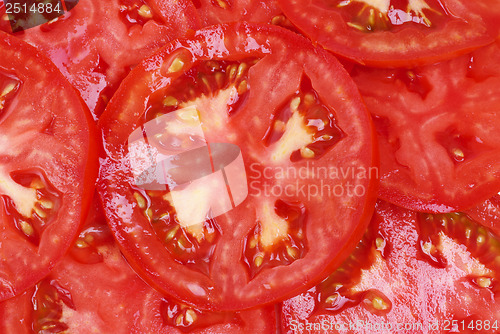 Image of fresh red tomato sliced as background 