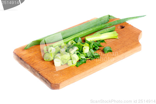 Image of fresh sliced onions  on cutting board isolated on white