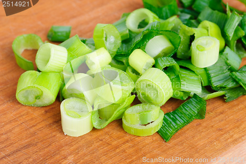 Image of fresh sliced onions on cutting board