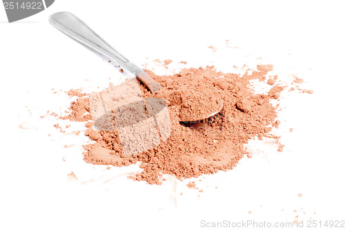 Image of Cocoa  powder  and  steel  spoon  isolation on  white
