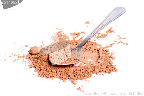 Image of Cocoa  powder  and  steel  spoon  isolation on  white