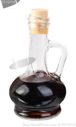 Image of Small decanter with balsamico vinegar  isolated on the  white background