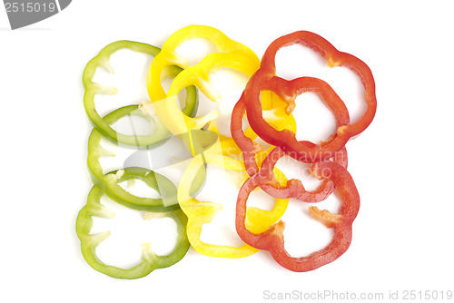 Image of red,green, yellow sliced pepper isolated on white background 