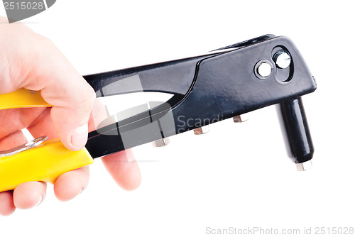 Image of Riveters in a hand on a white background 