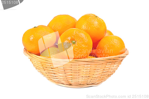 Image of fresh mandarines in  dishes for fruit  over white background