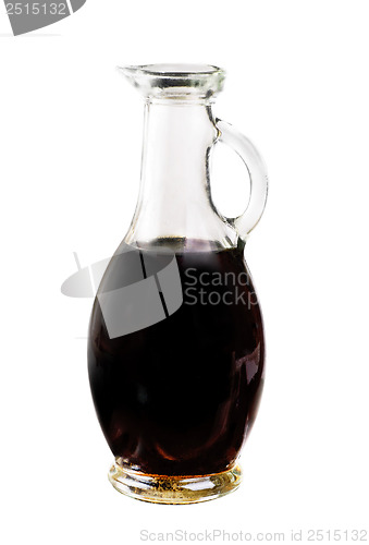 Image of Small decanter with balsamic vinegar isolated on the white background