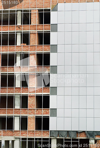 Image of Office building construction site. Thermal insulation of walls 