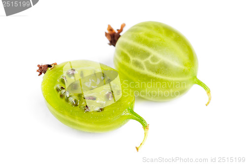 Image of Whole and sliced green gooseberry fruit closeup with seed on white background 