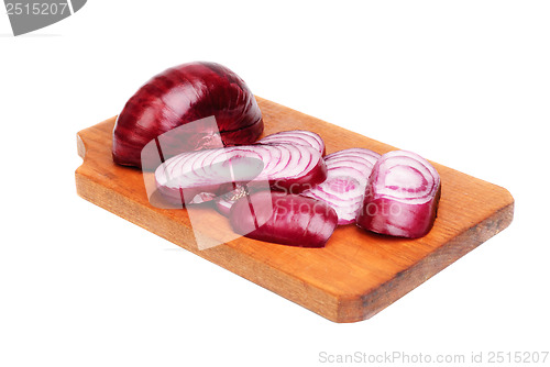 Image of sliced purple onions on cutting board isolated on white 