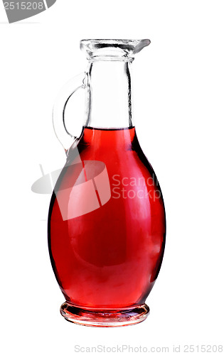 Image of Small decanter with red wine vinegar isolated on the white 