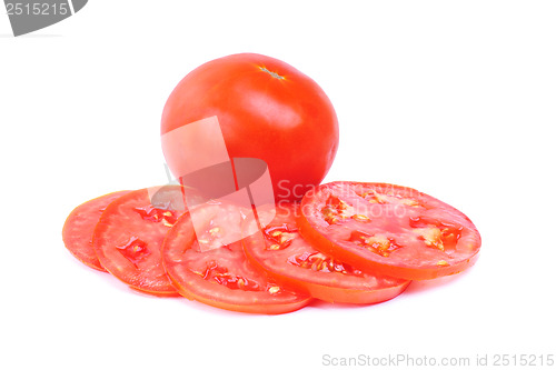 Image of whole and sliced fresh red tomatoes isolated on white background 