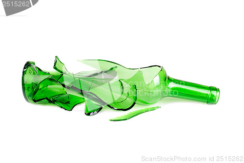 Image of Shattered green wine bottle isolated on the white background 
