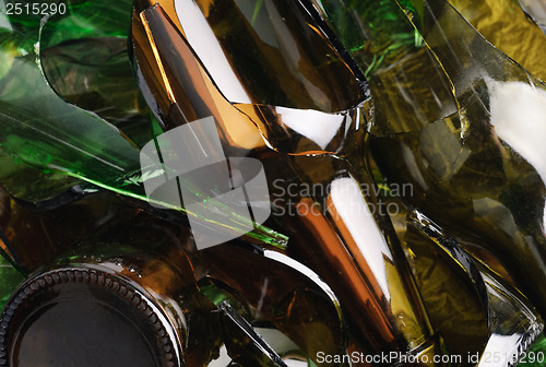 Image of Waste glass.Recycled.Shattered green and brown bottle 