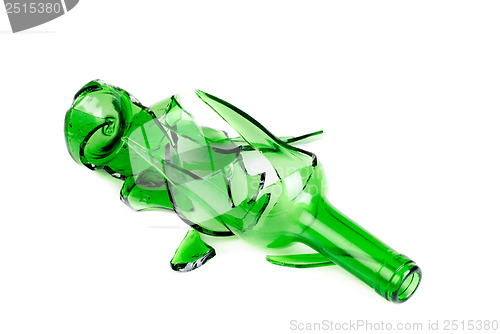 Image of Shattered green wine bottle isolated on the white background 